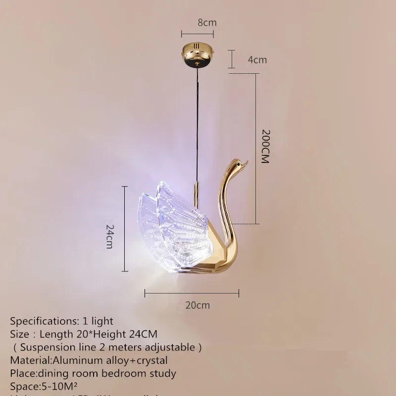 Gold swan-shaped pendant light with dimensions and specifications on a beige background