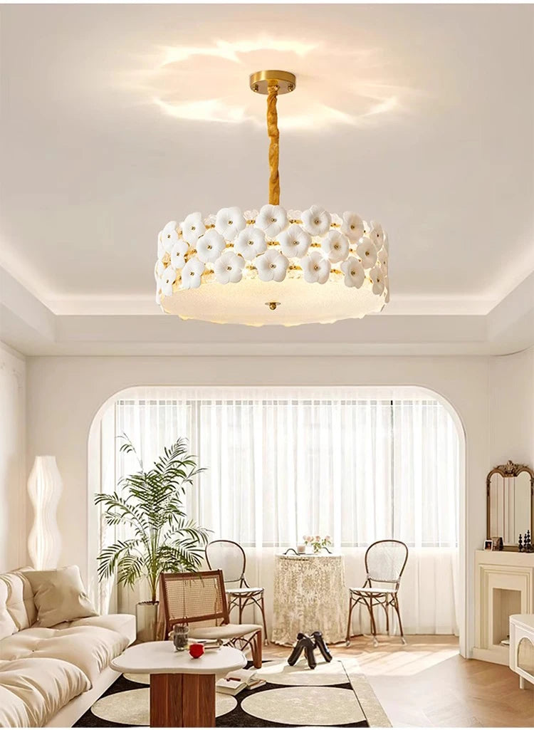 Modern living room with a decorative ceiling light fixture.