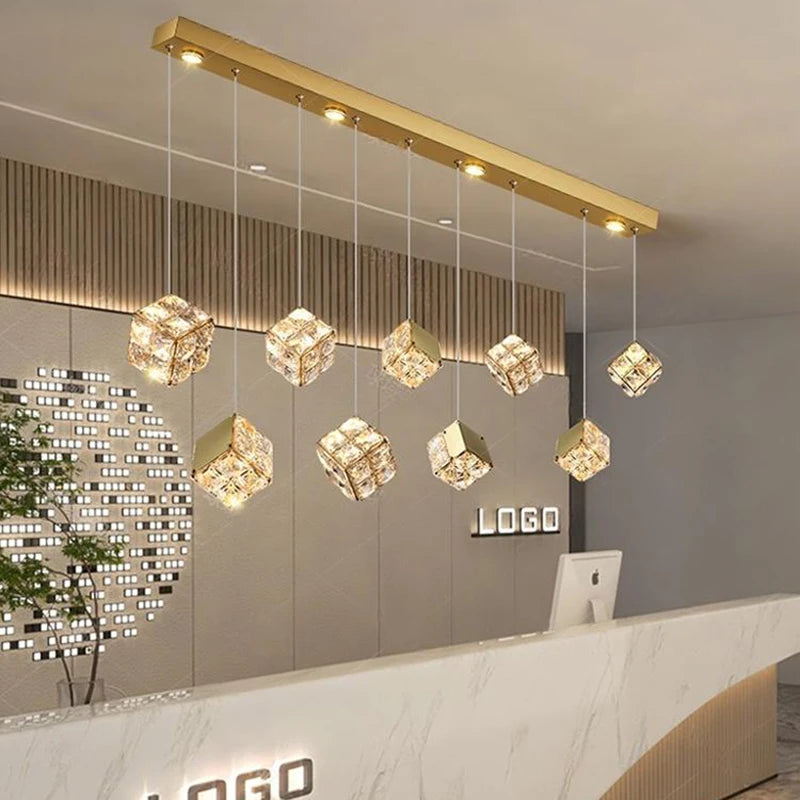 Modern chandelier with gold accents in a stylish interior setting.