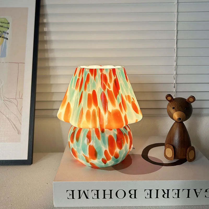 Colorful lamp with a teddy bear on a shelf