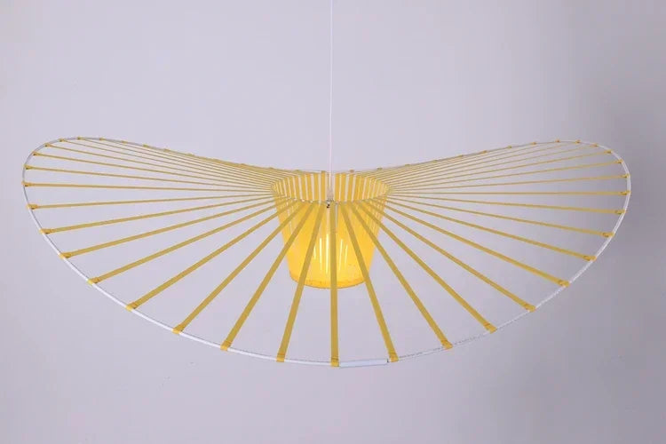 Yellow ceiling light fixture with fan-like design on a gray background