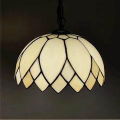 Cream colored dome-shaped Tiffany style stained glass pendant light with black leading