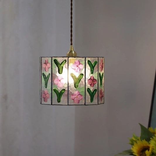 Hexagonal glass pendant light with pink floral and green leaf motifs