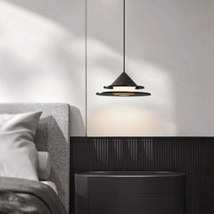 Side view of a black tiered pendant light with a cone-shaped top and disc-shaped tiers.