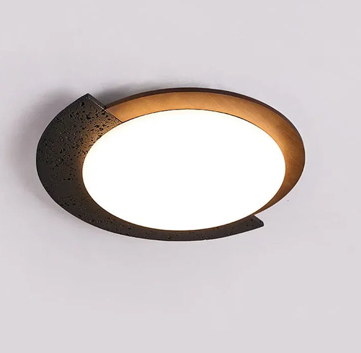 Ceiling light fixture with a modern design on a plain background