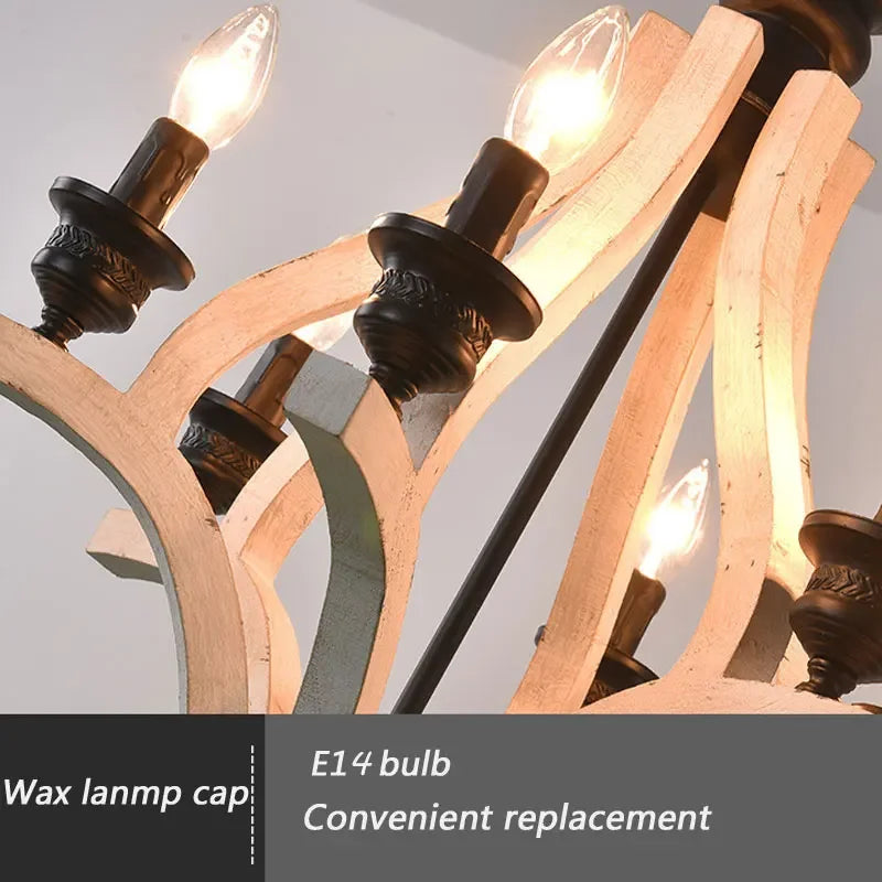 Wooden chandelier with black wax lamp caps and E14 bulb compatibility on a gray background.