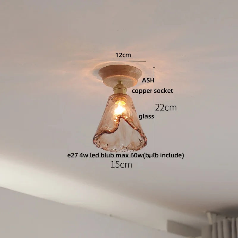 Ceiling light fixture with measurements labeled on a white ceiling.