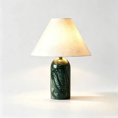Green stone art ceramic table lamp with a conical fabric shade, shown on a white background.