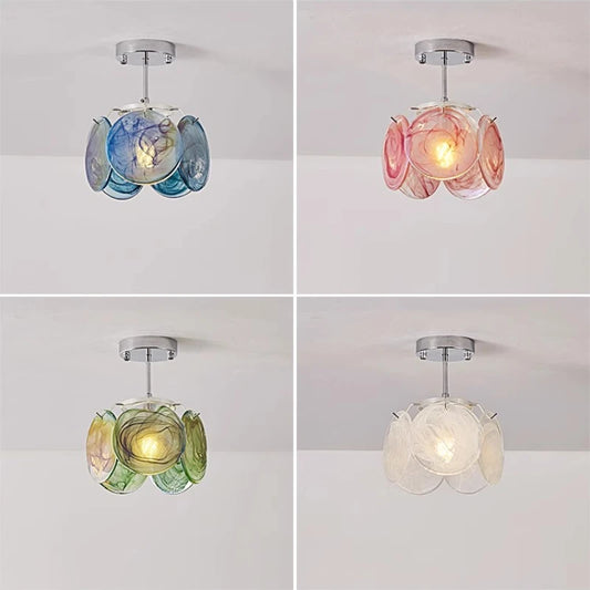 Chain-hung type floral glass pendant light in pink and white swirls, suspended by a chain.
