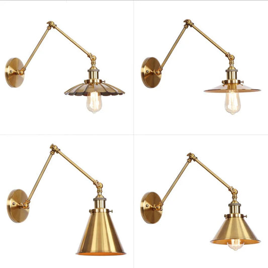 Brushed gold adjustable wall sconce with a cone shade, seen from the side.