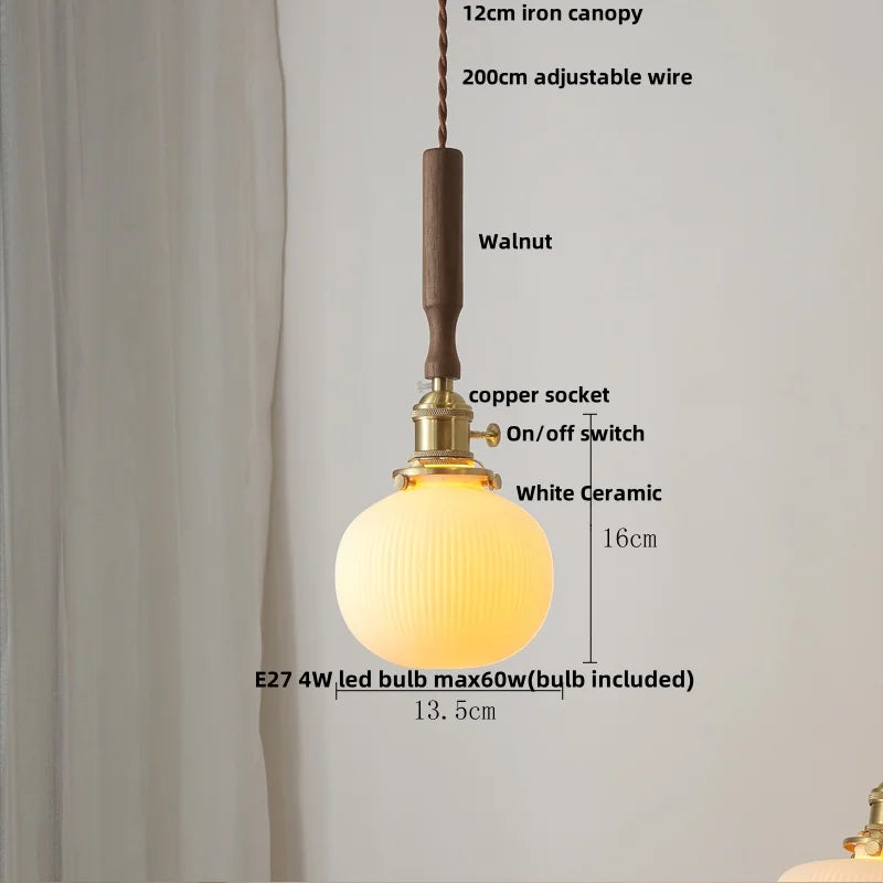 Pendant light with labeled components on a white background