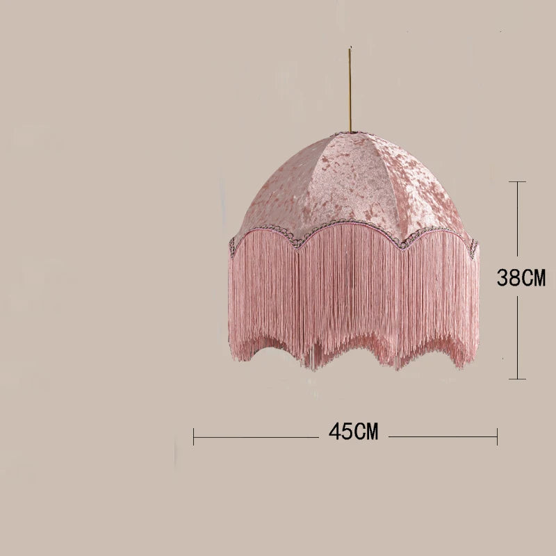 Pink velvet dome pendant light with fringe, showing dimensions 45cm width and 38cm height.