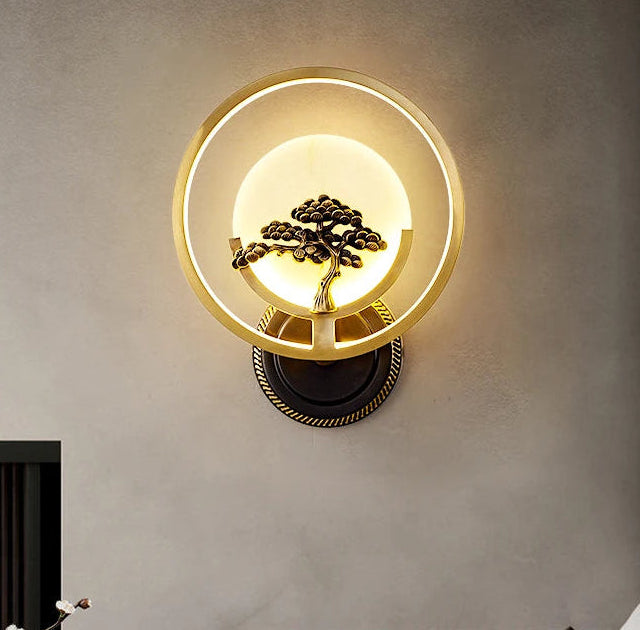 Decorative wall light fixture on a neutral wall with minimal decor.