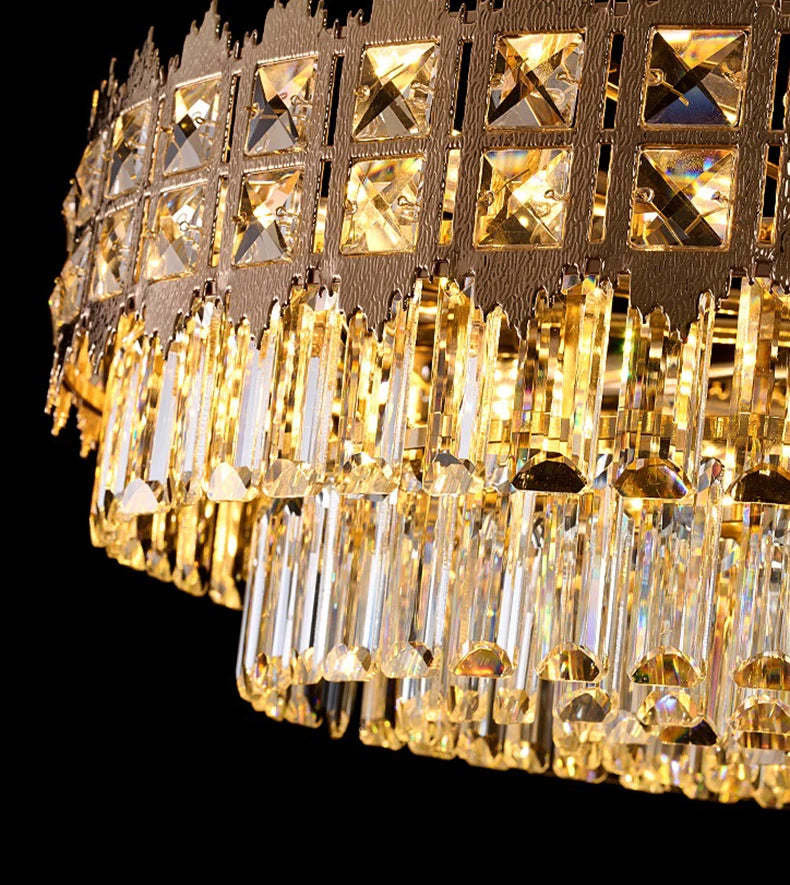 Gold chandelier with crystal-like design on a black background