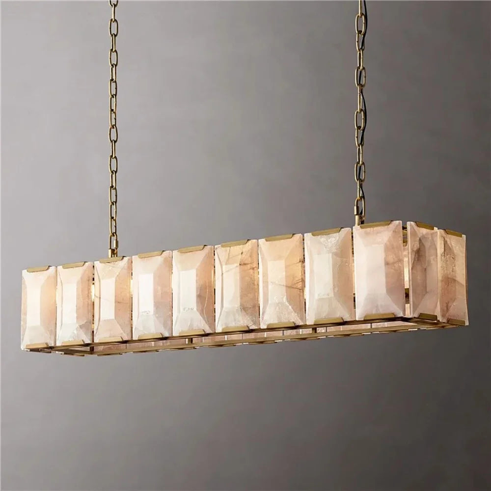 Rectangular pendant light with marble-like finish on a gray background