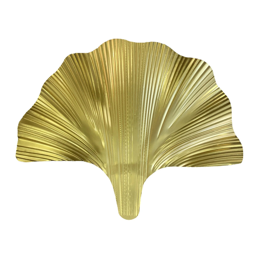 Gold leaf-shaped decorative item on a white background