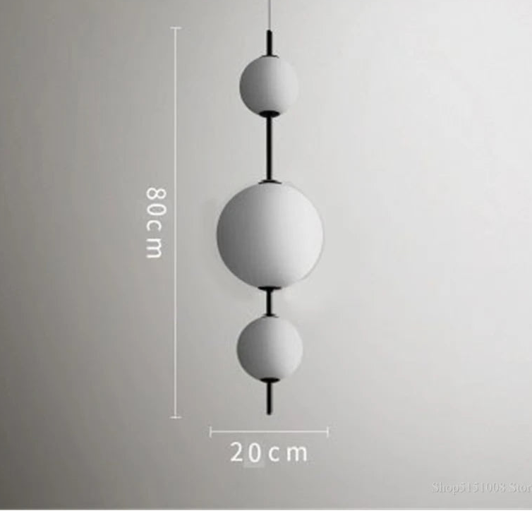 Pendant light with dimensions on a gray background