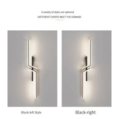 Close-up of a modern geometric wall sconce showcasing its gold finish and angular design.
