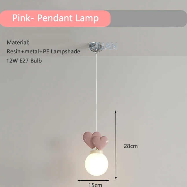 Pink pendant lamp with heart-shaped design on a gray background
