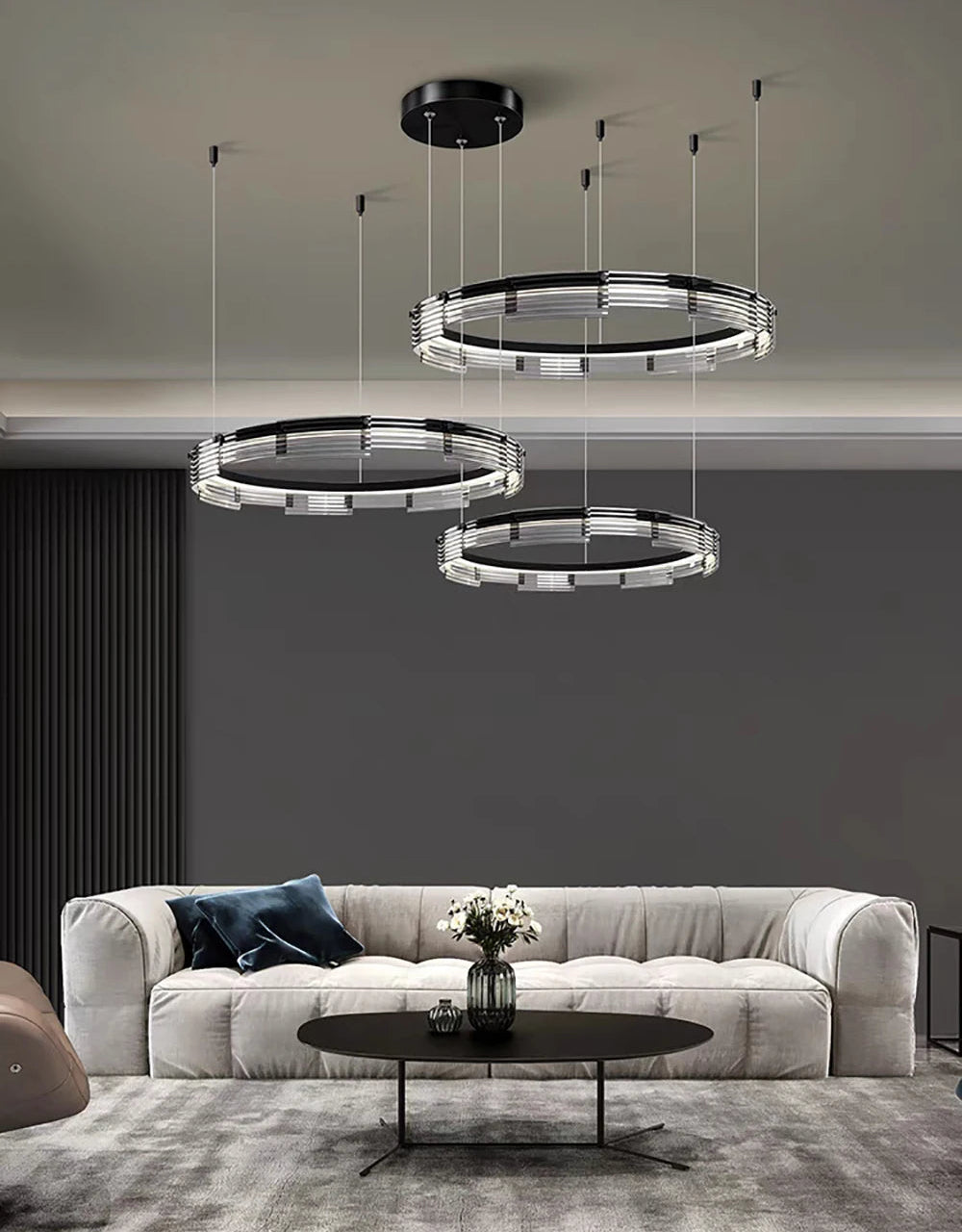 Modern living room with pendant lights and a sofa.