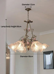 Gold Metal Chandelier with Rose Bud Accents and Frosted Glass Shades