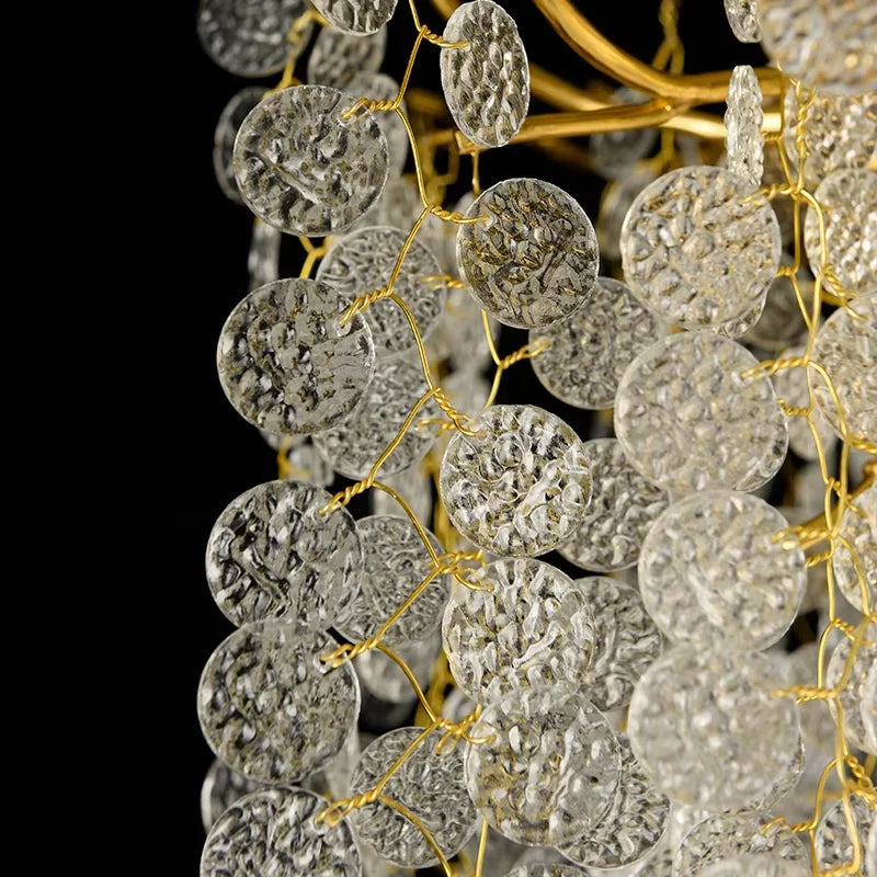 A second angle of the gold cascading crystal pendant light showing its overall shape and density of crystals.