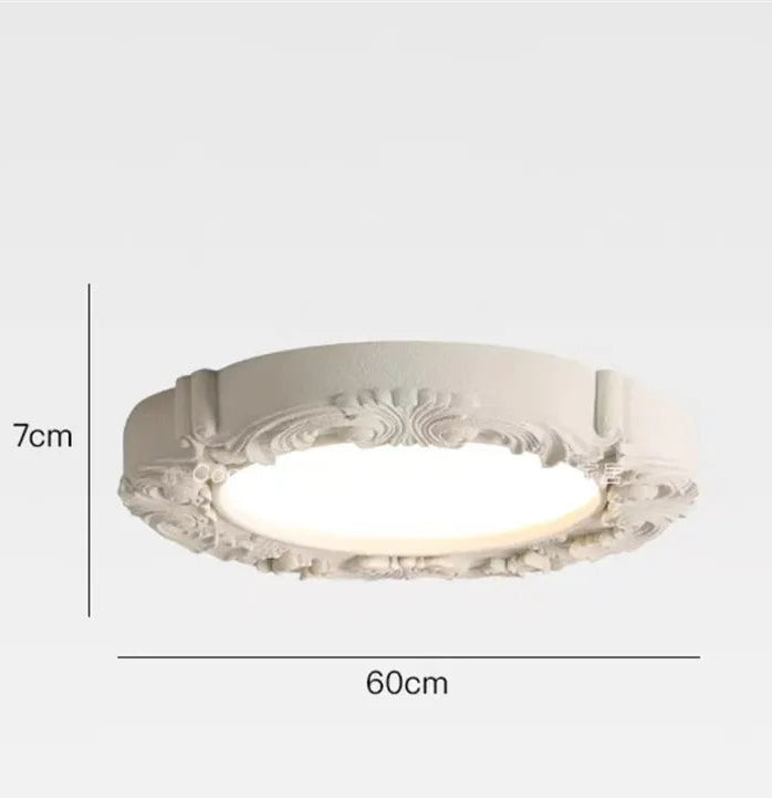 Decorative ceiling light with dimensions on a white background
