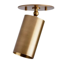 Gold cylindrical light fixture on a white background