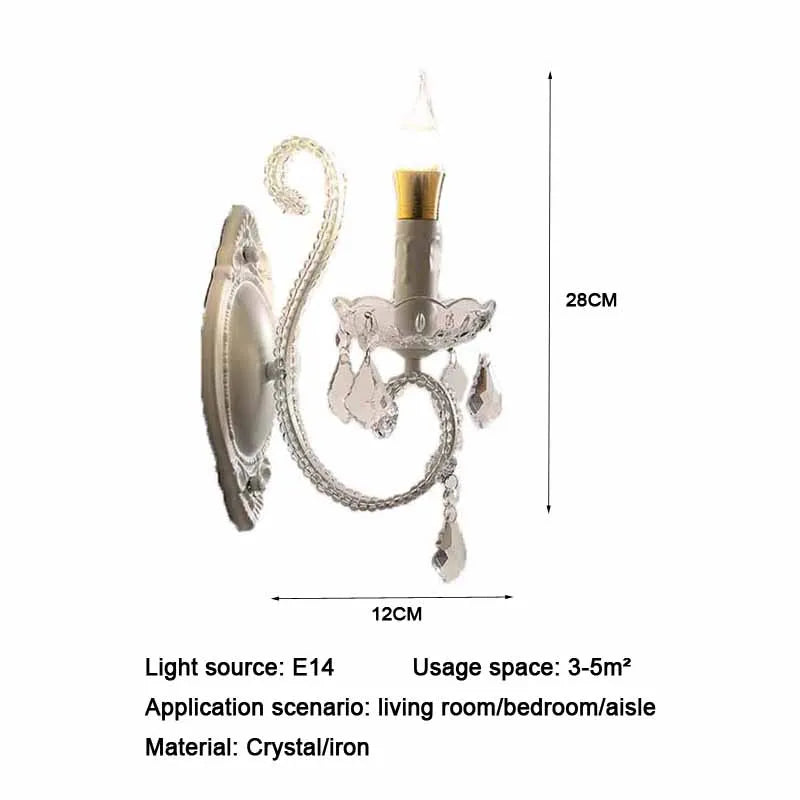 White crystal candelabra style wall sconce with dimensions indicated for height and width.