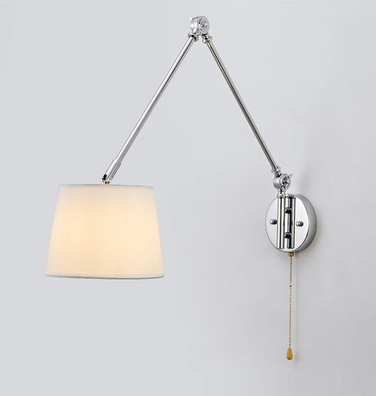 Wall-mounted lamp with adjustable arm on a light gray background
