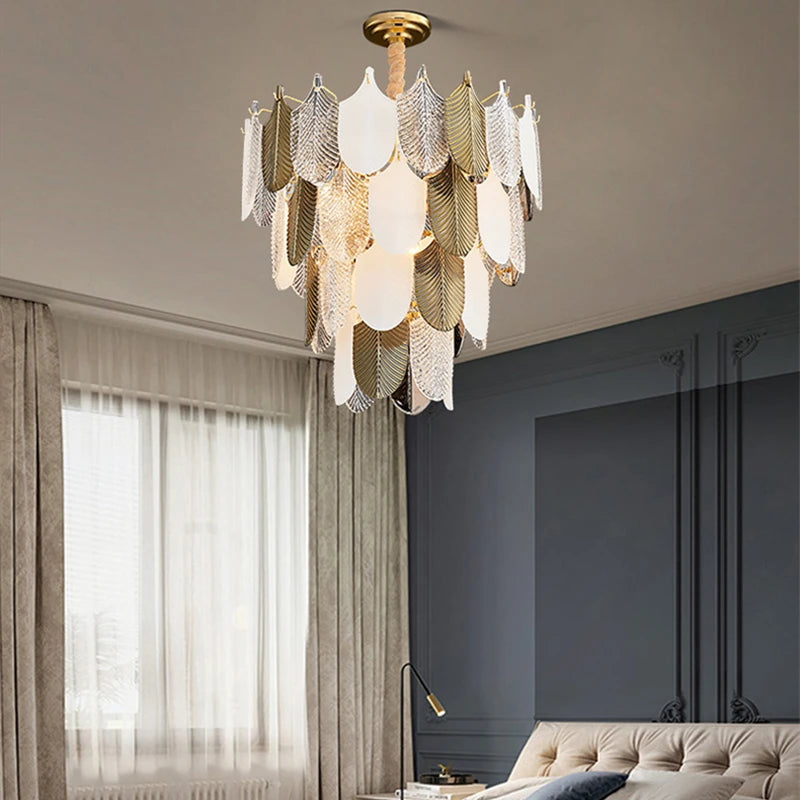 Chandelier hanging in a room with a window and sofa