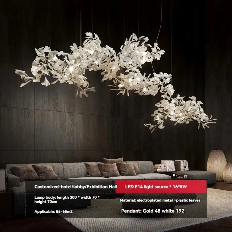 Modern chandelier hanging above a sofa in a dimly lit room