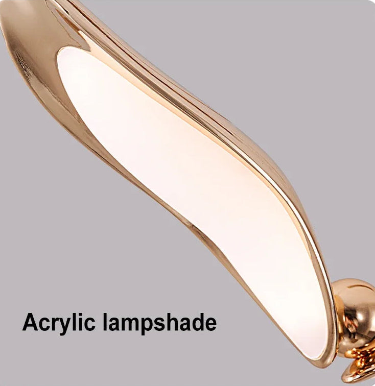 Gold acrylic lampshade on a gray background