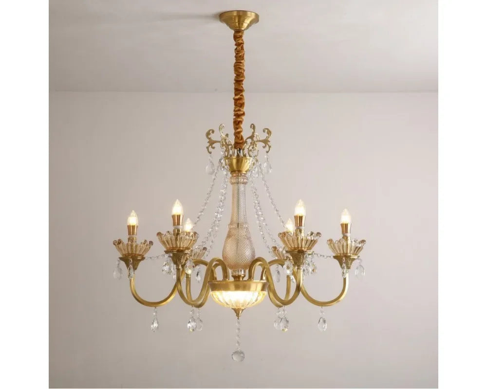 A different angle of the gold crystal chandelier, highlighting its overall structure and light distribution.