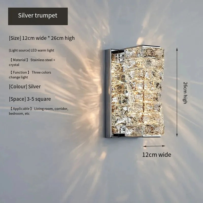 Wall-mounted light fixture with crystal design on a white wall, featuring dimensions and specifications.
