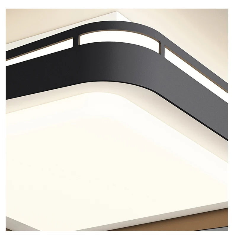 Ceiling light fixture with black and white design