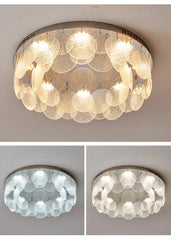 Split image showing a chrome ceiling light with textured glass discs illuminated in different color temperatures (cool white, warm white)