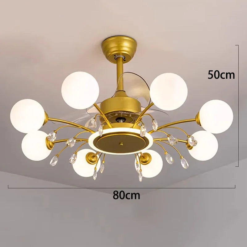 Gold chandelier with white lights on a plain background