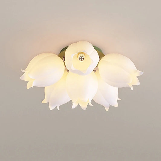White orchid blossom flush mount ceiling light with multiple tulip-shaped shades