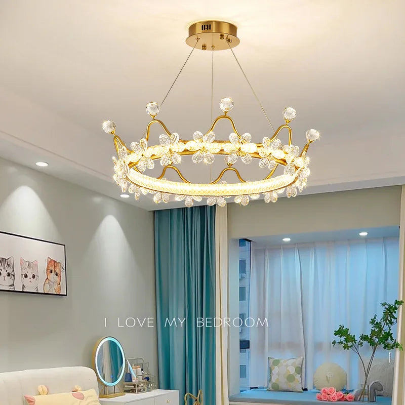 Gold chandelier in a bedroom with light blue curtains and a 'I Love My Bedroom' sign.