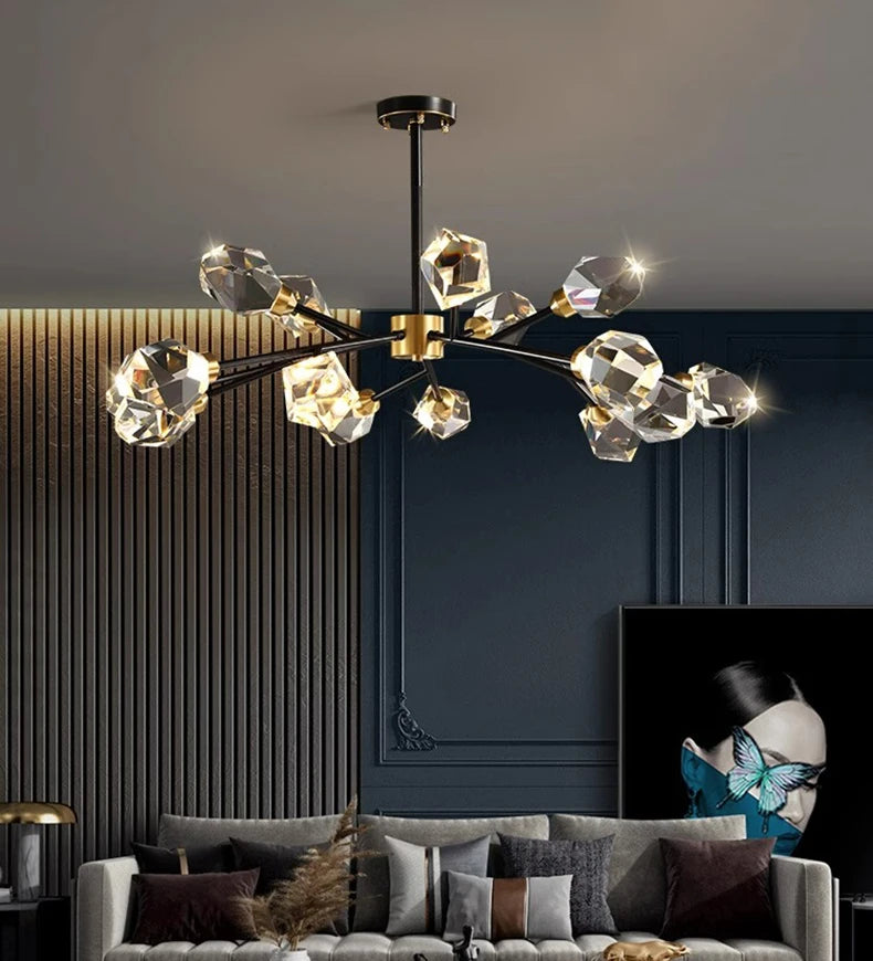 Modern chandelier with crystal accents in a living room setting.