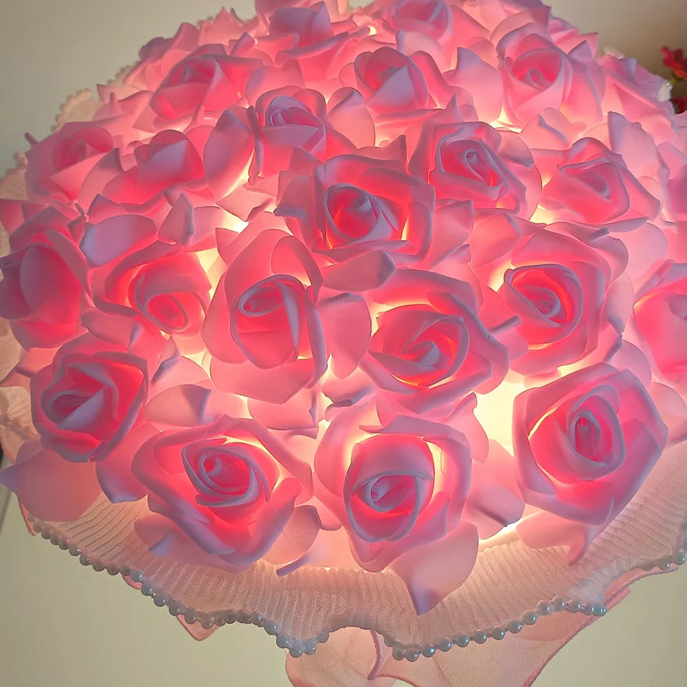 Decorative lamp with pink roses on a white background