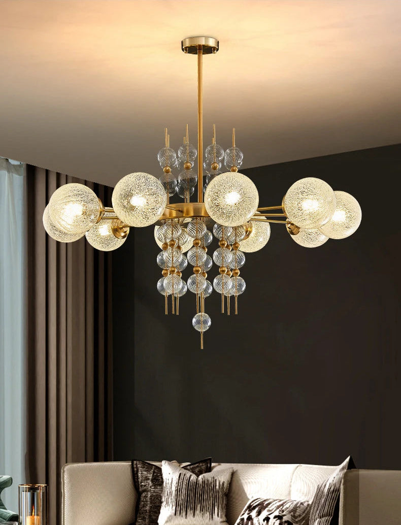 Modern chandelier with glass bulbs in a living room setting