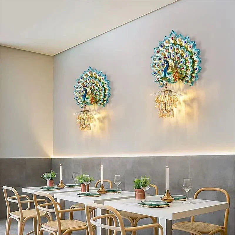 Dining room with peacock-themed wall lights and a table set for four.