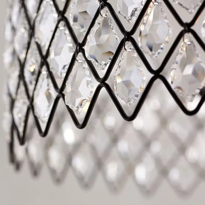 Close-up of a chandelier with crystal-like design on a blurred background