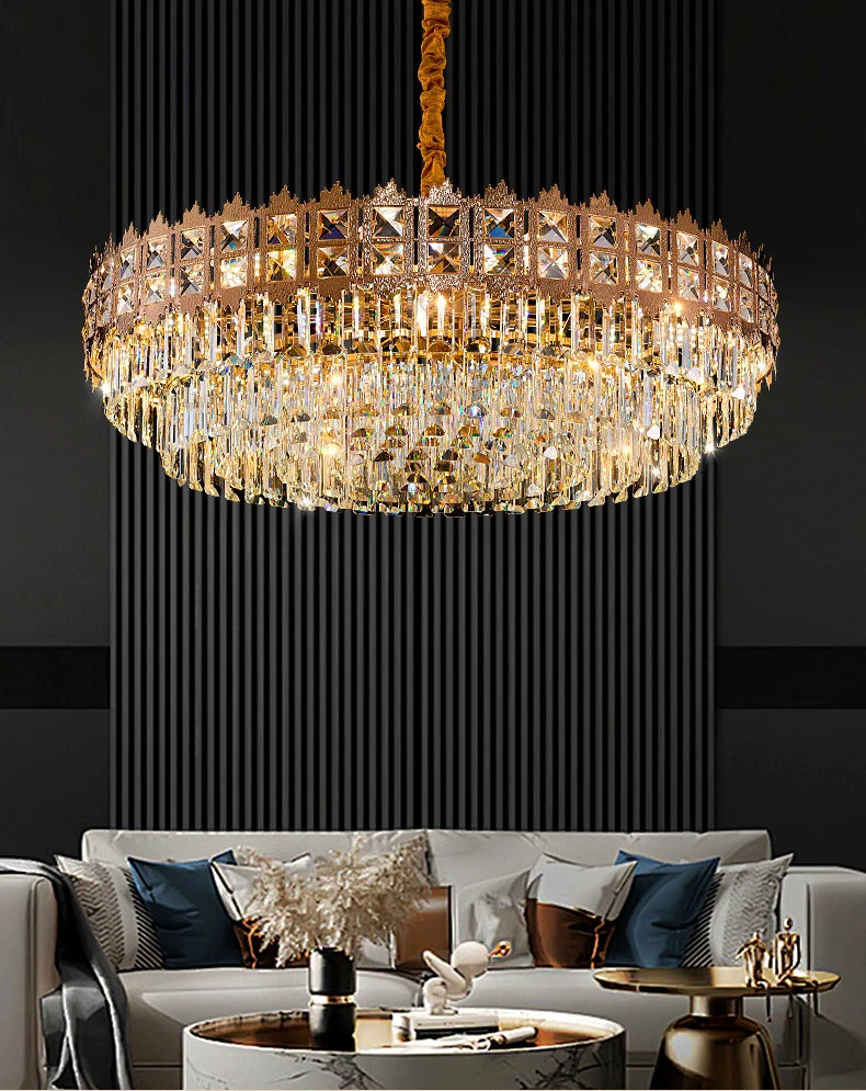 Chandelier hanging above a living room with a dark background