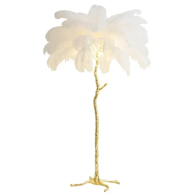 Palm tree-shaped lamp with white feathers on a white background