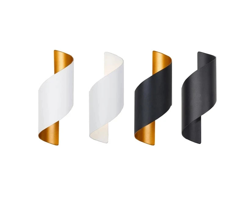 Set of four wall sconces with gold and black accents on a white background