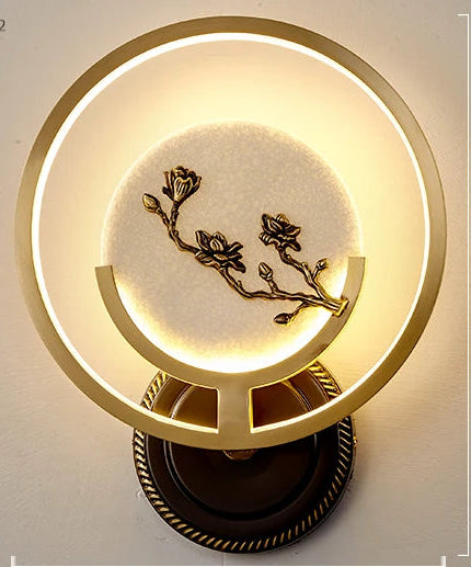 Wall lamp with floral design on a light gray background
