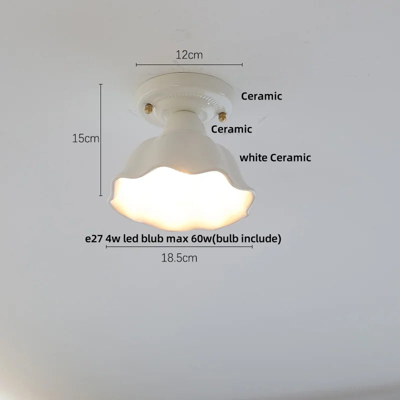 White ceramic ceiling light fixture with dimensions and bulb information on a gray background